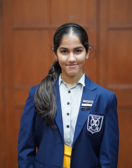 Alyssa Vora in her school blazer